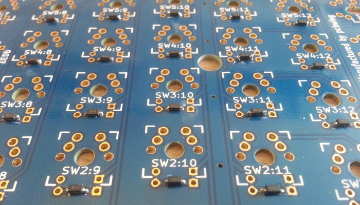 Close-up photo of my keyboard's circuit boards with the surface mount diodes all soldered.